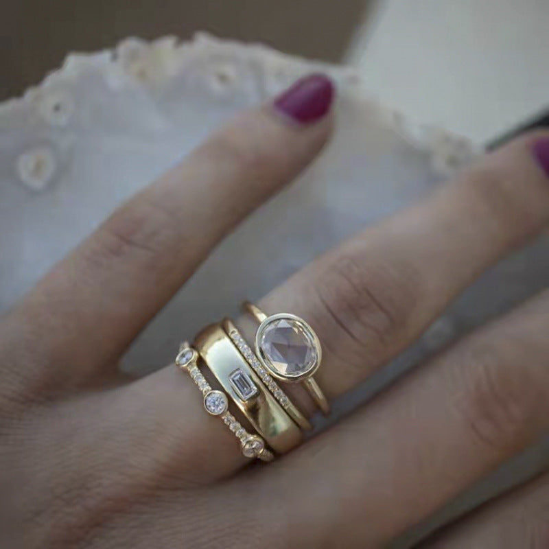 Anello combinato in oro e zirconi